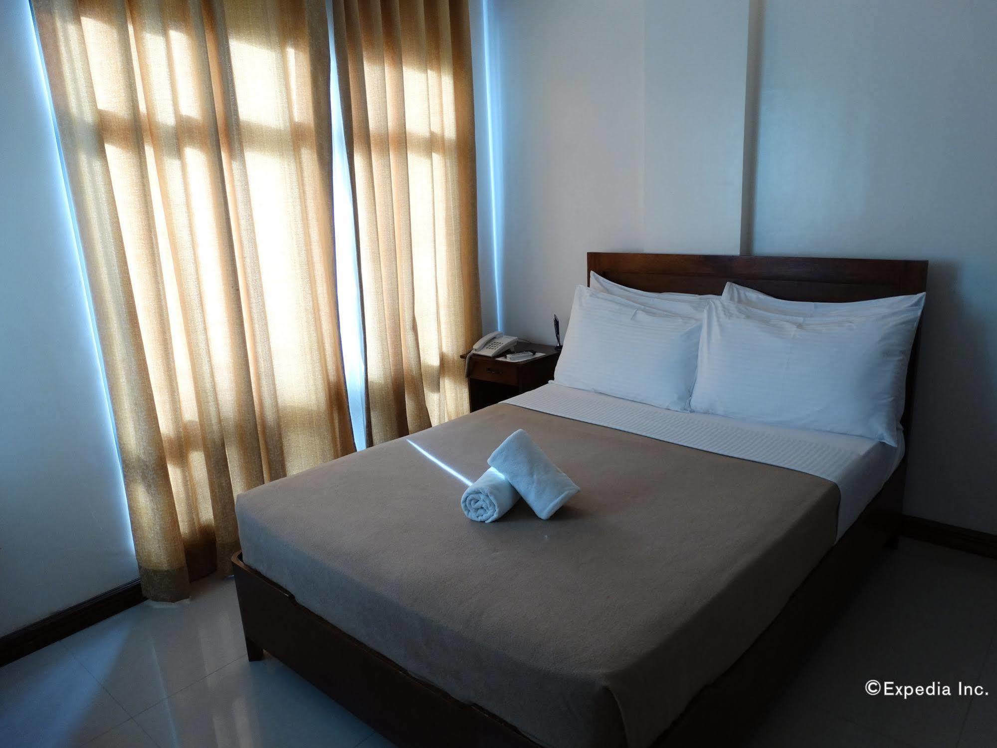 อีปิล สวีทโฮเต็ล ปวยร์โต ปรินเซซา Hotel Puerto Princesa ภายนอก รูปภาพ