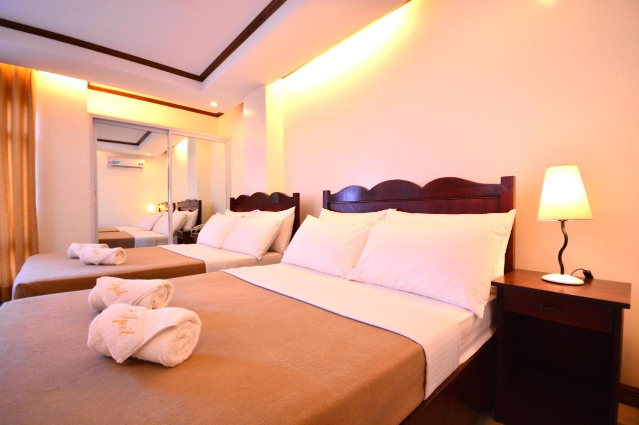 อีปิล สวีทโฮเต็ล ปวยร์โต ปรินเซซา Hotel Puerto Princesa ภายนอก รูปภาพ